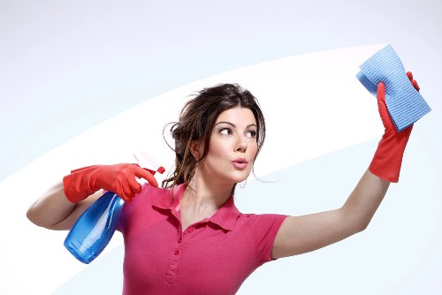 Local carpet cleaner treating stains in a Peckham property
